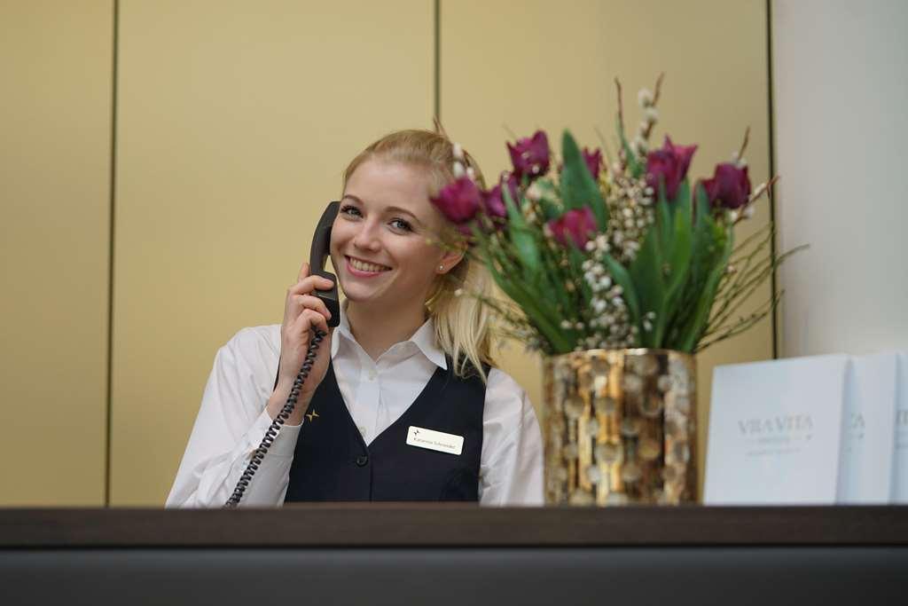 Vila Vita Rosenpark Marburg Interior photo A receptionist at the front desk of a hotel
