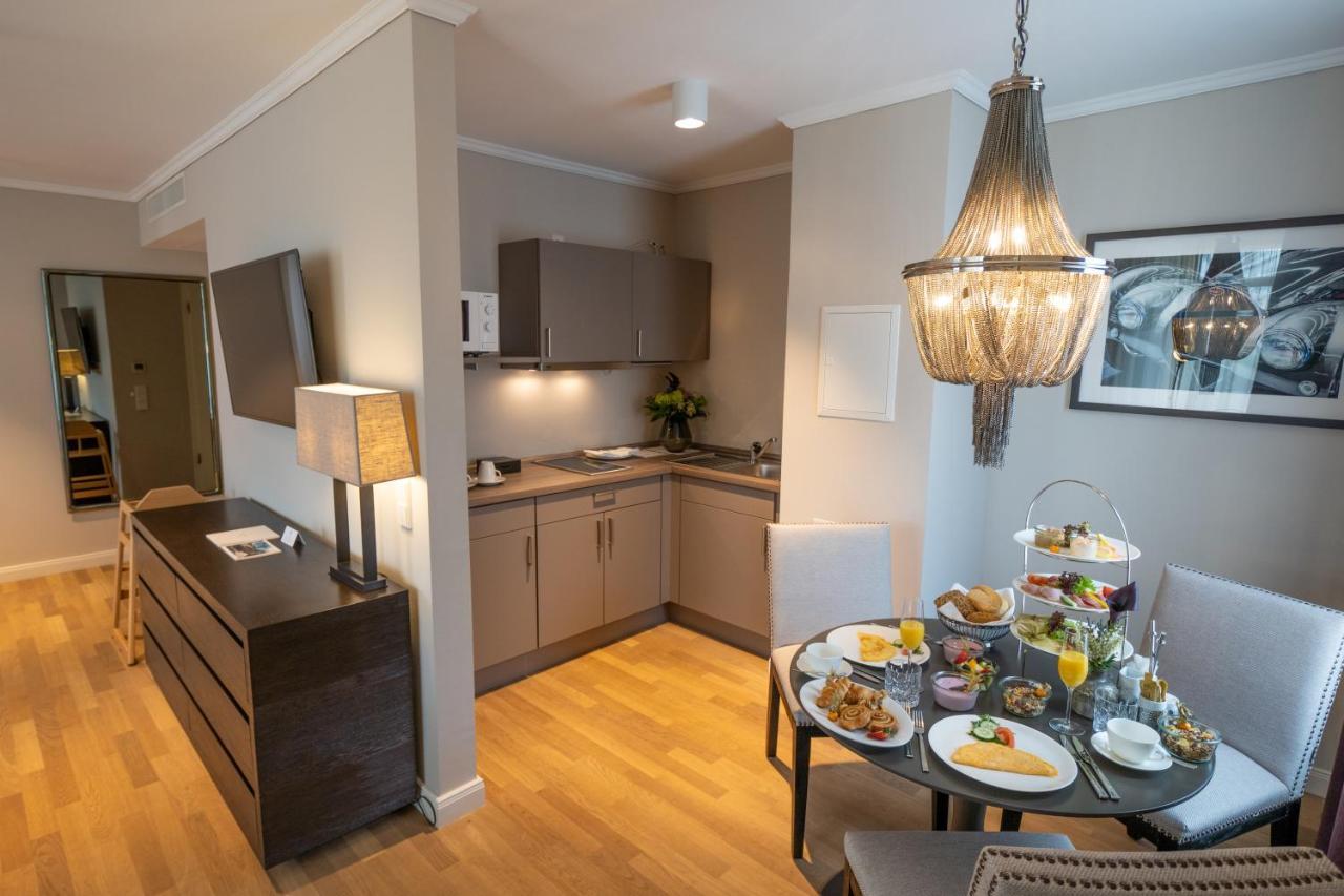 Vila Vita Rosenpark Marburg Exterior photo A kitchen in a serviced apartment