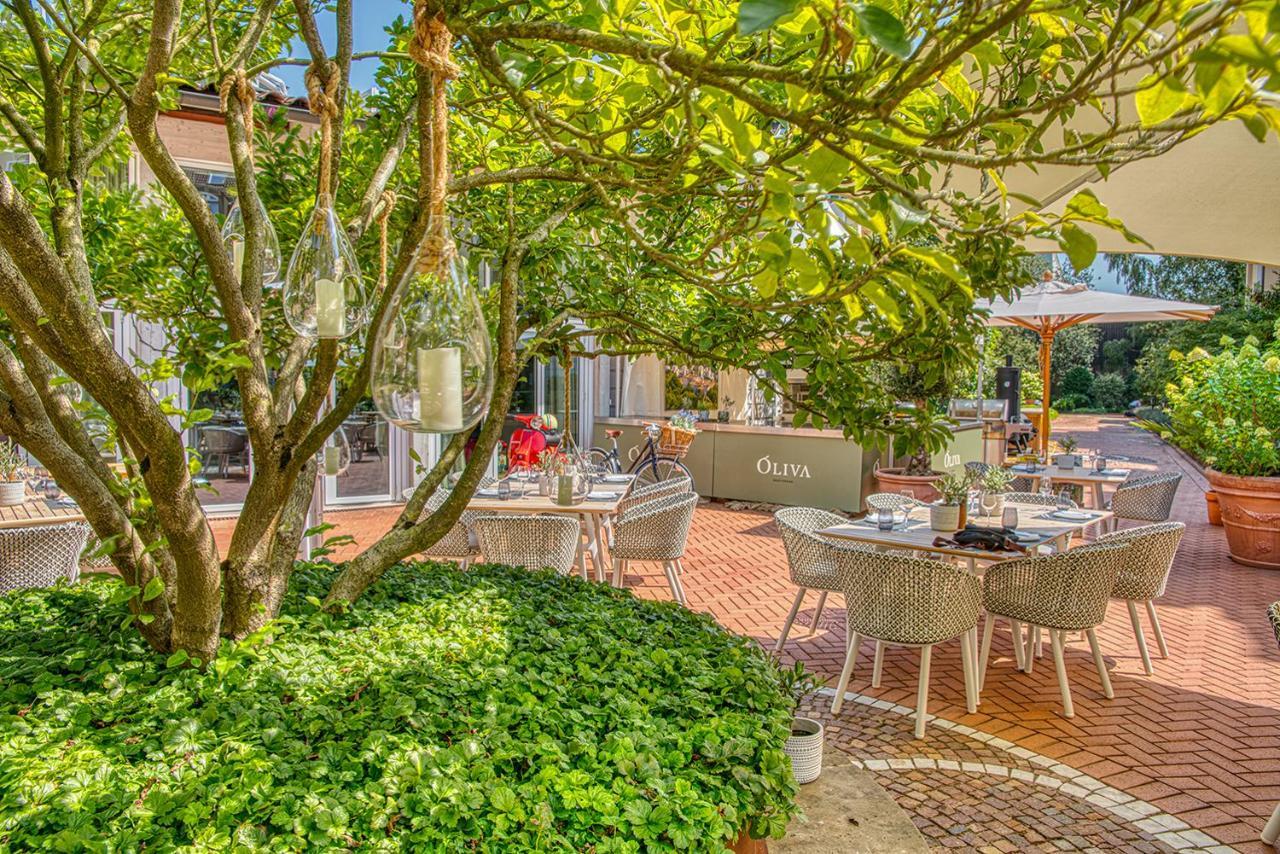 Vila Vita Rosenpark Marburg Exterior photo The garden of the restaurant